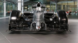 The front wing is closer to the ground to prevent the cars lifting in collisions